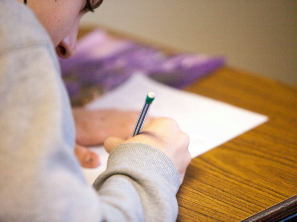 a student takes an act or sat test before college admission
