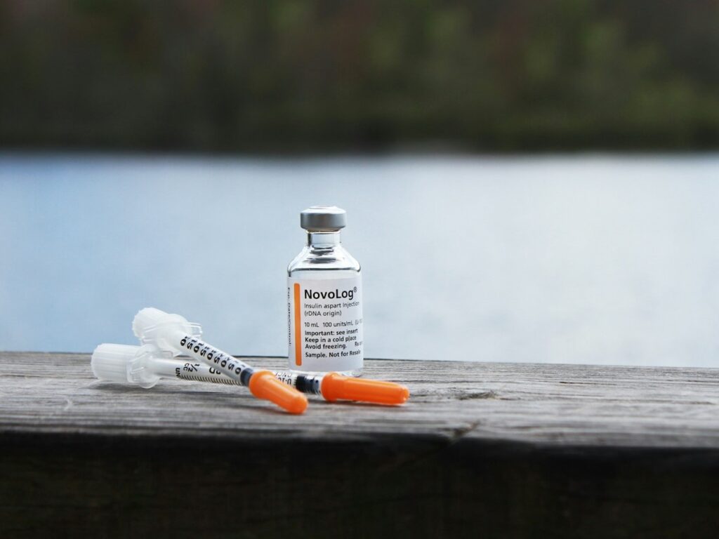 a vile and syringes filled with insulin