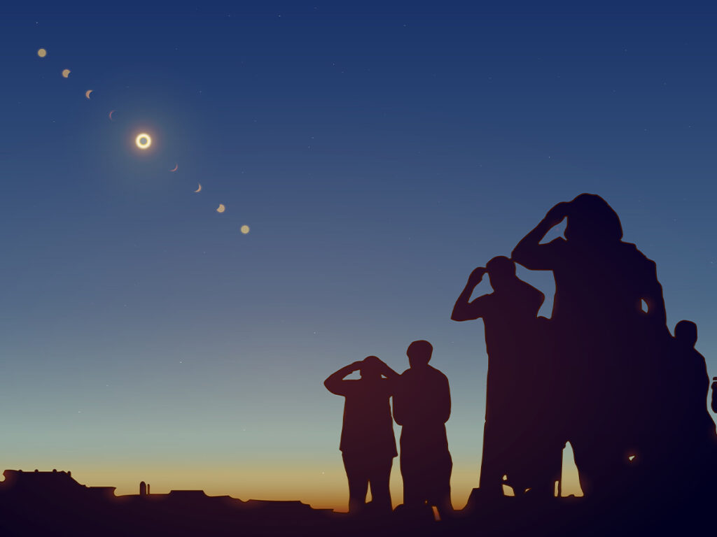 people stand outside looking at a total solar eclipse