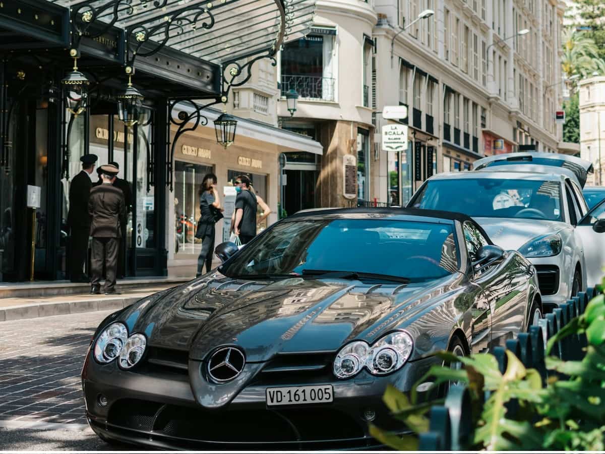 expensive cars lined up outside a casino hotel in monaco
