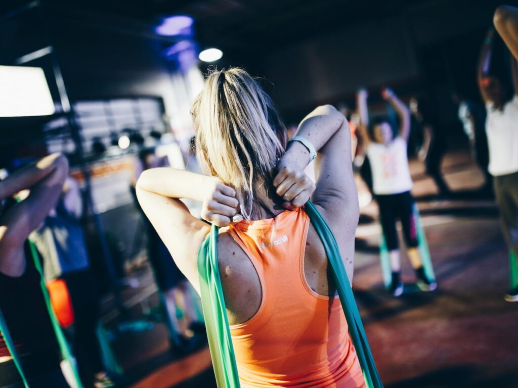 a woman stretches and practices movement while having myasthenia gravis