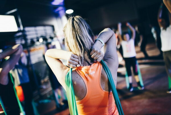 a woman stretches and practices movement while having myasthenia gravis