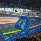 L.A. charger fans wave flags and watch a game played under the new 2025 nfl rules