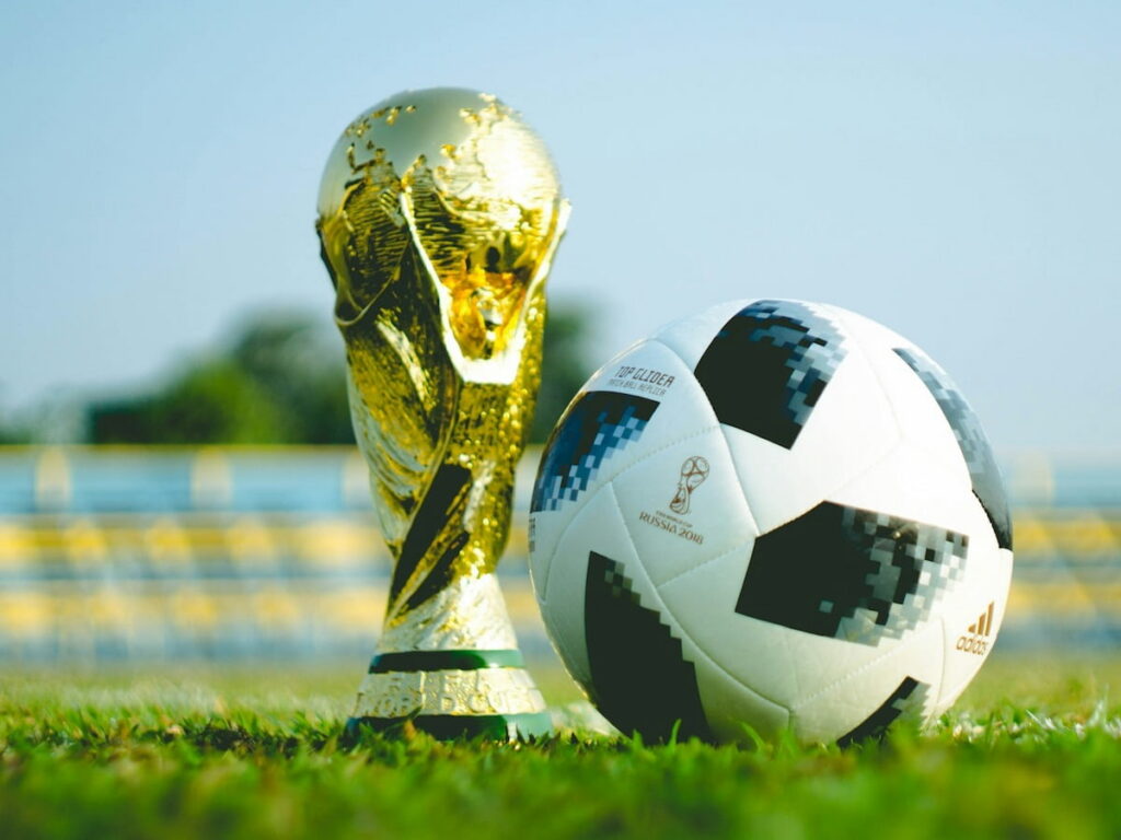 a world cup trophy and ball