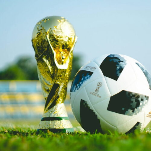 a world cup trophy and ball