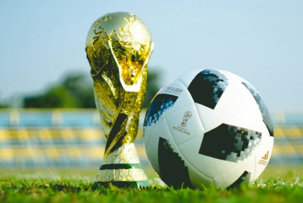 a world cup trophy and ball
